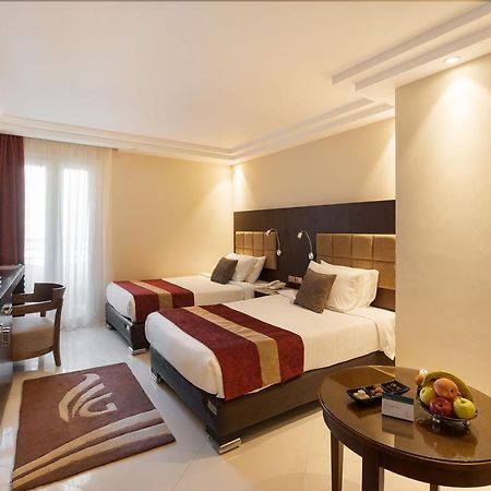 Grand Ocean El Sokhna Hotel Ain Sukhna Bagian luar foto A room at the hotel