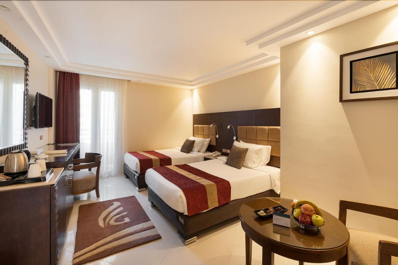 Grand Ocean El Sokhna Hotel Ain Sukhna Bagian luar foto A room at the hotel