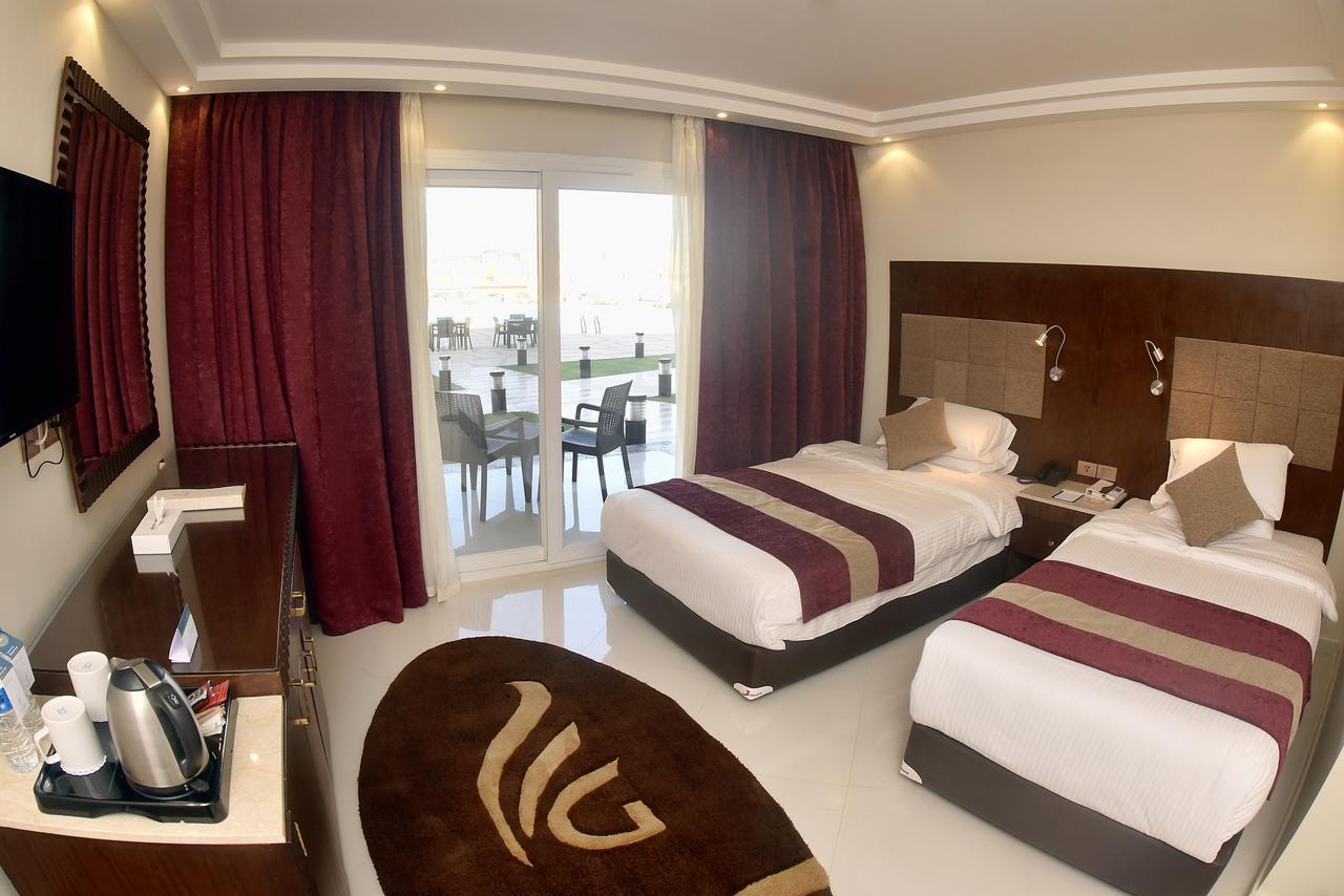 Grand Ocean El Sokhna Hotel Ain Sukhna Bagian luar foto A room at the hotel
