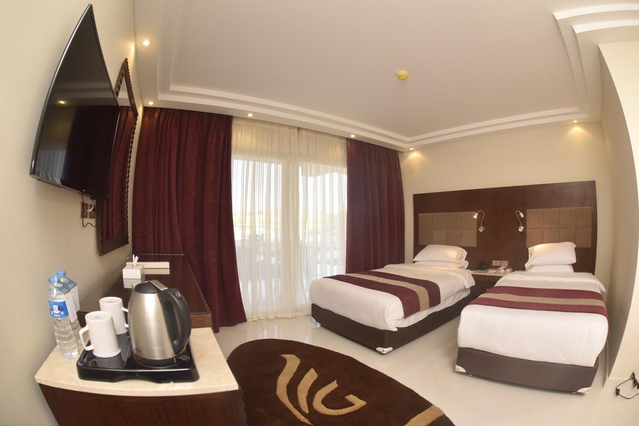 Grand Ocean El Sokhna Hotel Ain Sukhna Bagian luar foto A room at the hotel